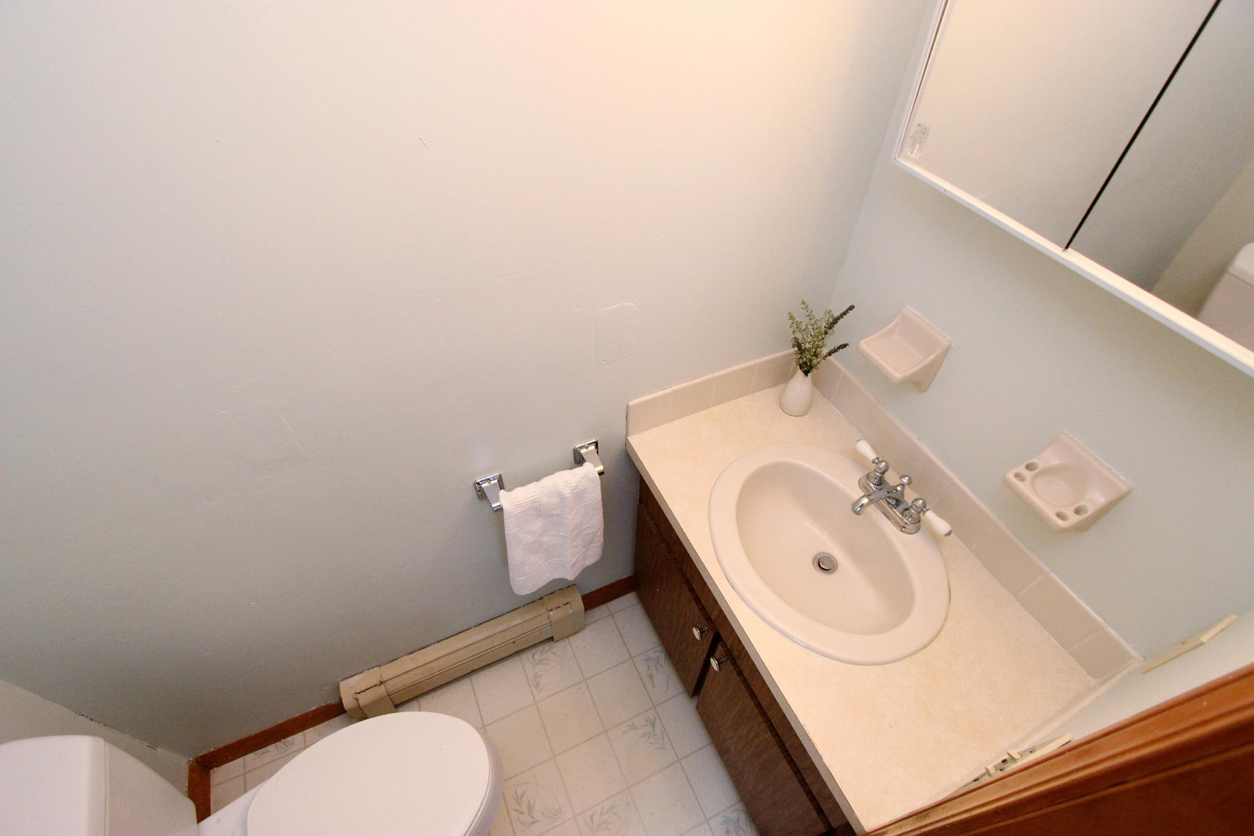 58 Colburne Path West Yarmouth, MA 02673 - Photo 30 of 39 a bathroom with a sink mirror vanity and toilet