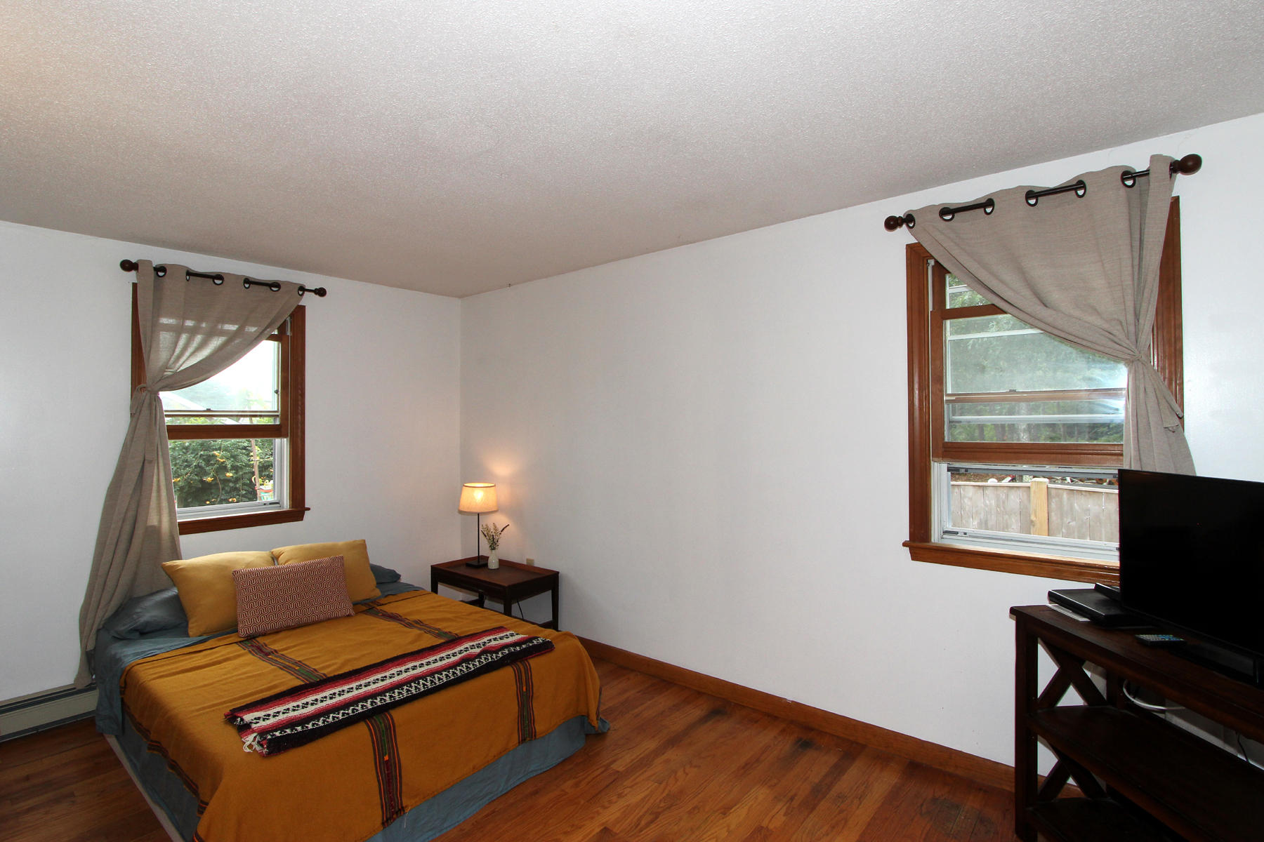 58 Colburne Path West Yarmouth, MA 02673 - Photo 31 of 39 a living room with furniture and a window