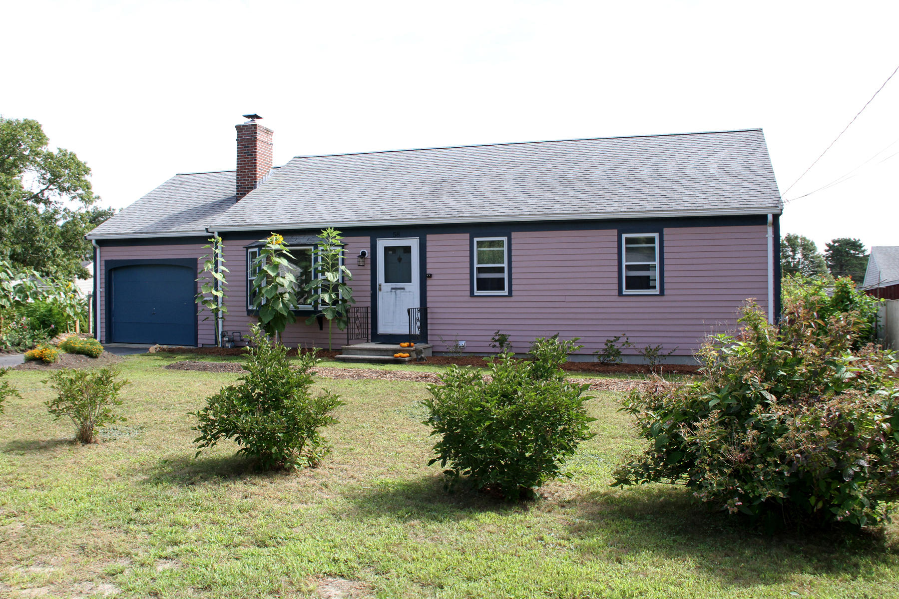 58 Colburne Path West Yarmouth, MA 02673 - Photo 39 of 39 a front view of a house with garden