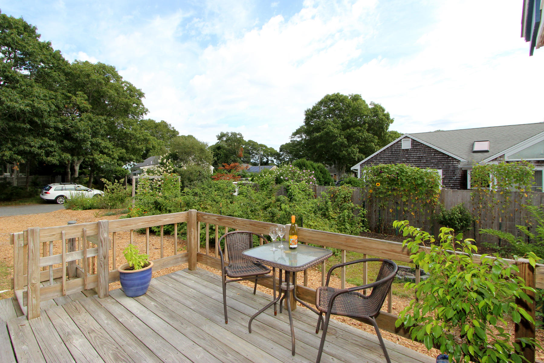 58 Colburne Path West Yarmouth, MA 02673 - Photo 7 of 39 a view of a chairs and table in the patio