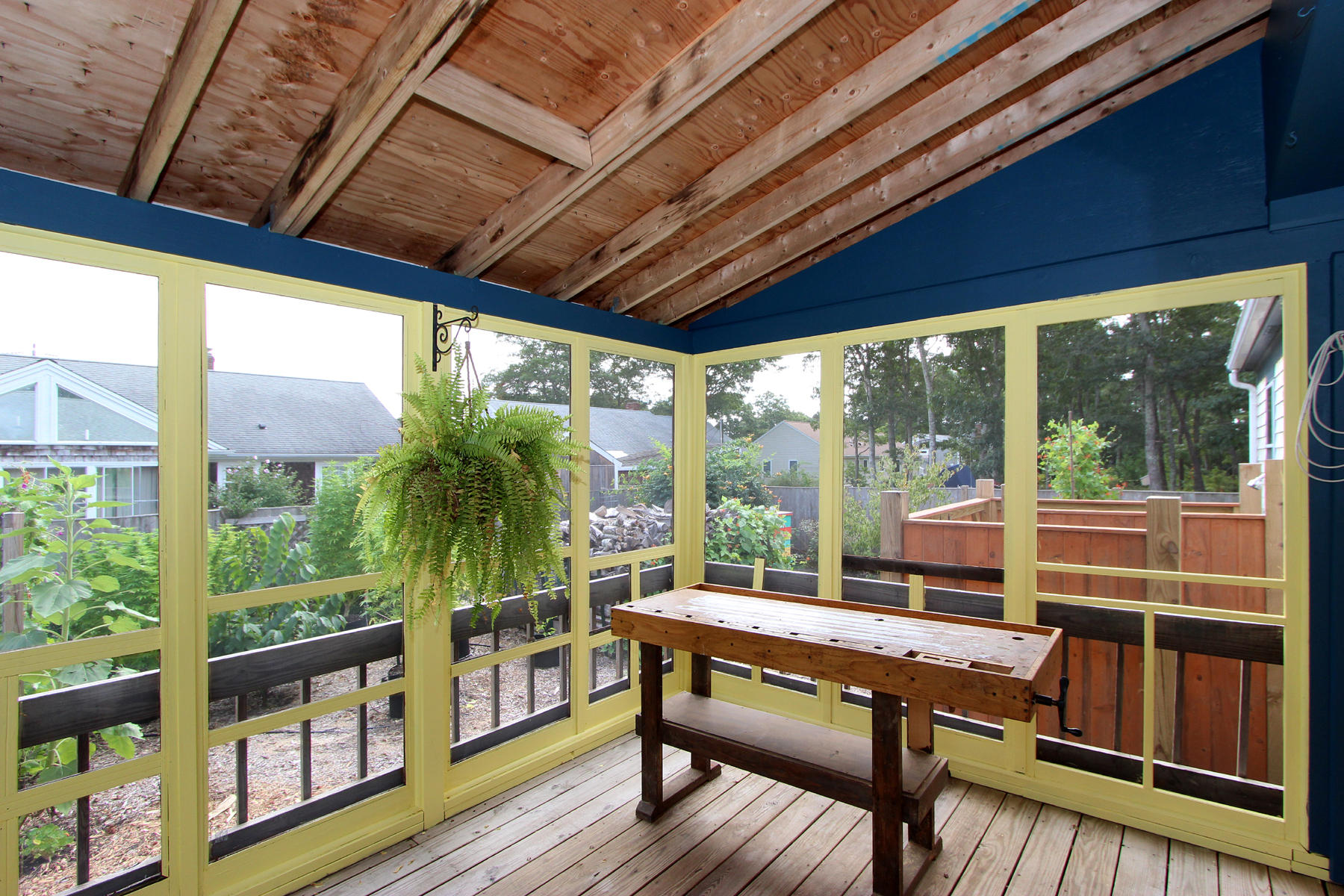58 Colburne Path West Yarmouth, MA 02673 - Photo 8 of 39 a view of a porch with furniture and wooden floor