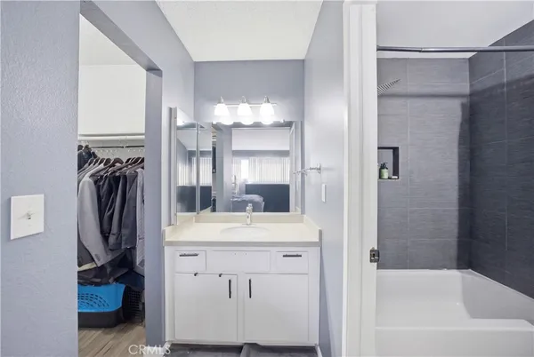 a bathroom with a sink and toilet