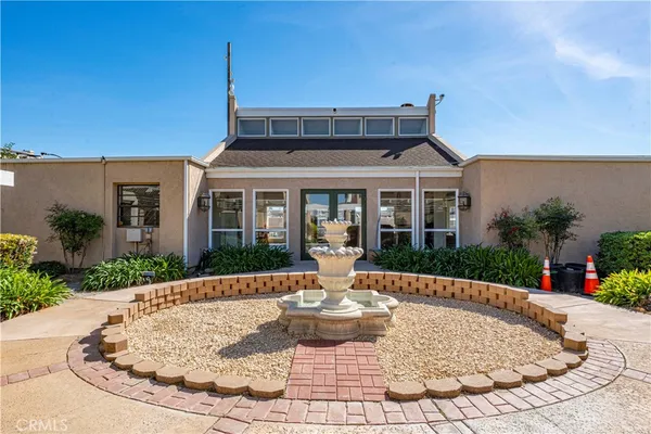 a view of a house with entertaining space