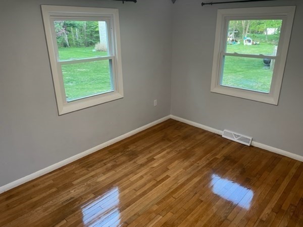 6 Hickey Road Hingham, MA 02043 - Photo 18 of 23 a view of a room with wooden floor and windows