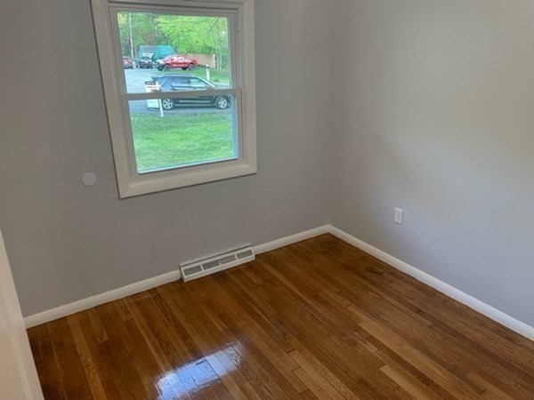 6 Hickey Road Hingham, MA 02043 - Photo 19 of 23 a view of room with window and wooden floor