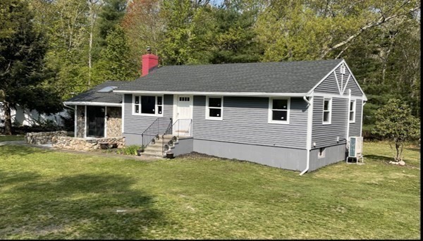 6 Hickey Road Hingham, MA 02043 - Photo 2 of 23 a view of a house with a yard and sitting area