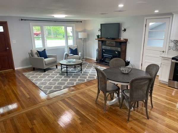 6 Hickey Road Hingham, MA 02043 - Photo 6 of 23 a living room with furniture and a flat screen tv