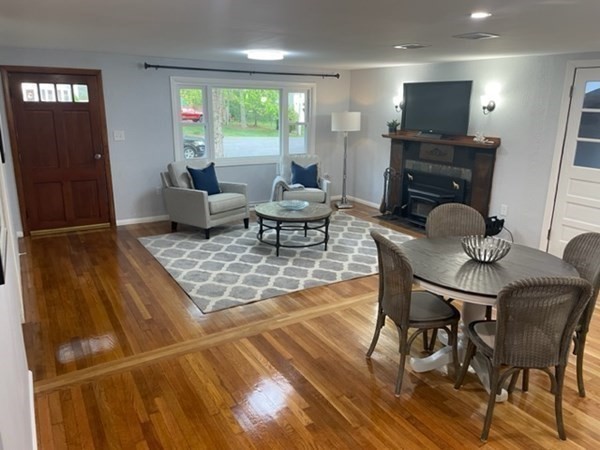 6 Hickey Road Hingham, MA 02043 - Photo 7 of 23 a living room with furniture and a flat screen tv