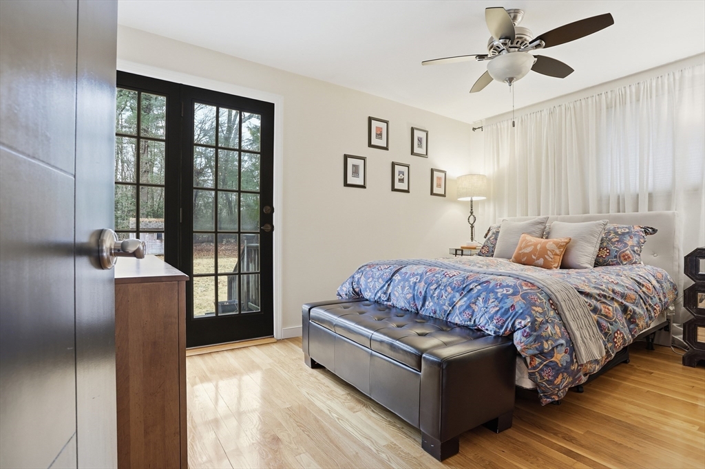 69 Robbins Road Sudbury, MA 01776 - Photo 14 of 35 a spacious bedroom with a bed and window