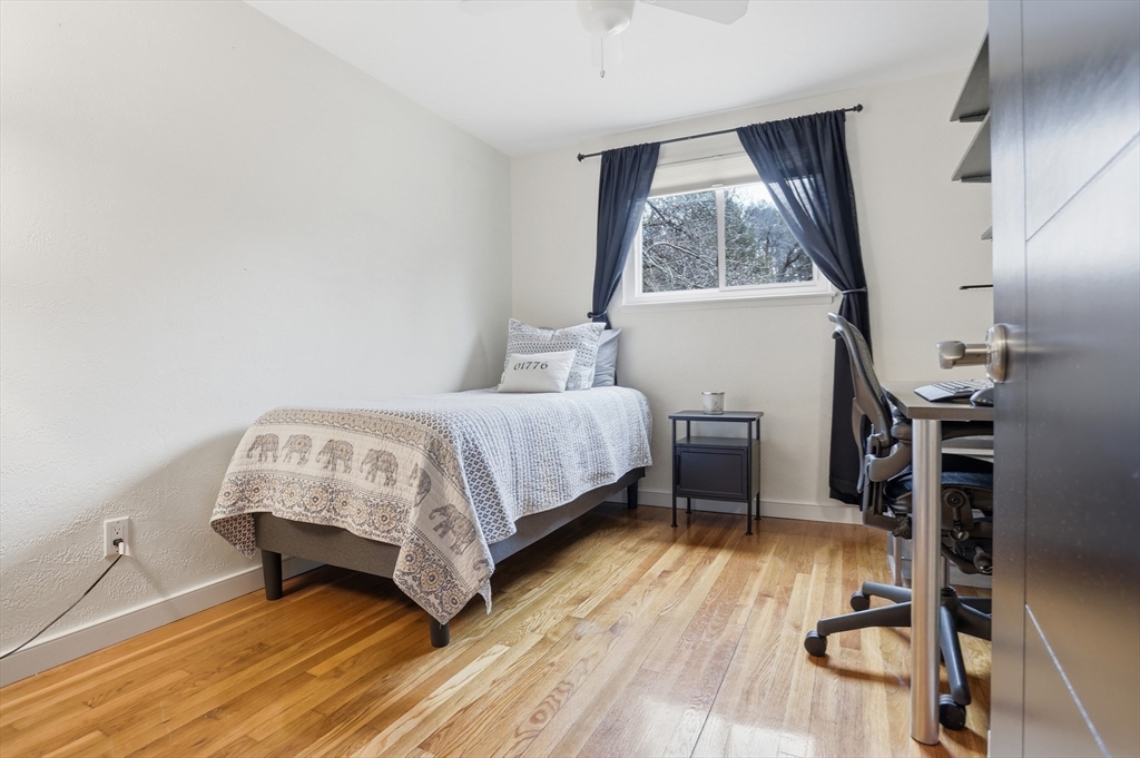 69 Robbins Road Sudbury, MA 01776 - Photo 21 of 35 a bedroom with a bed and a window