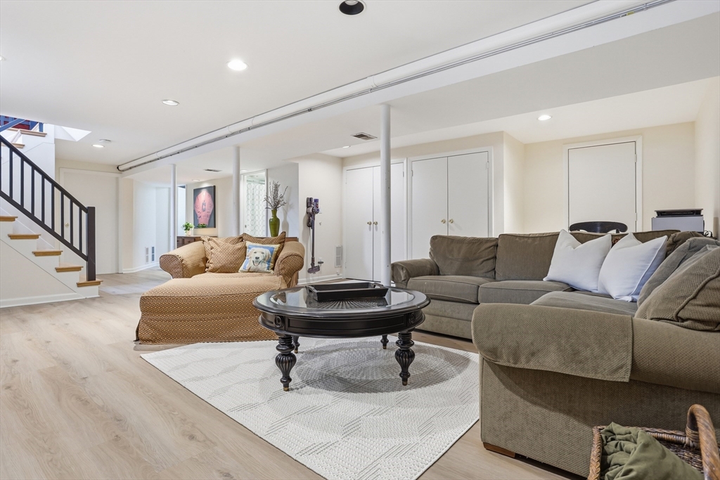 69 Robbins Road Sudbury, MA 01776 - Photo 23 of 35 a living room with furniture and a table