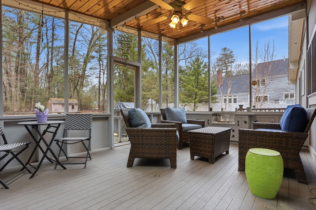 69 Robbins Road Sudbury, MA 01776 - Photo 28 of 35 a living room with furniture and a large window