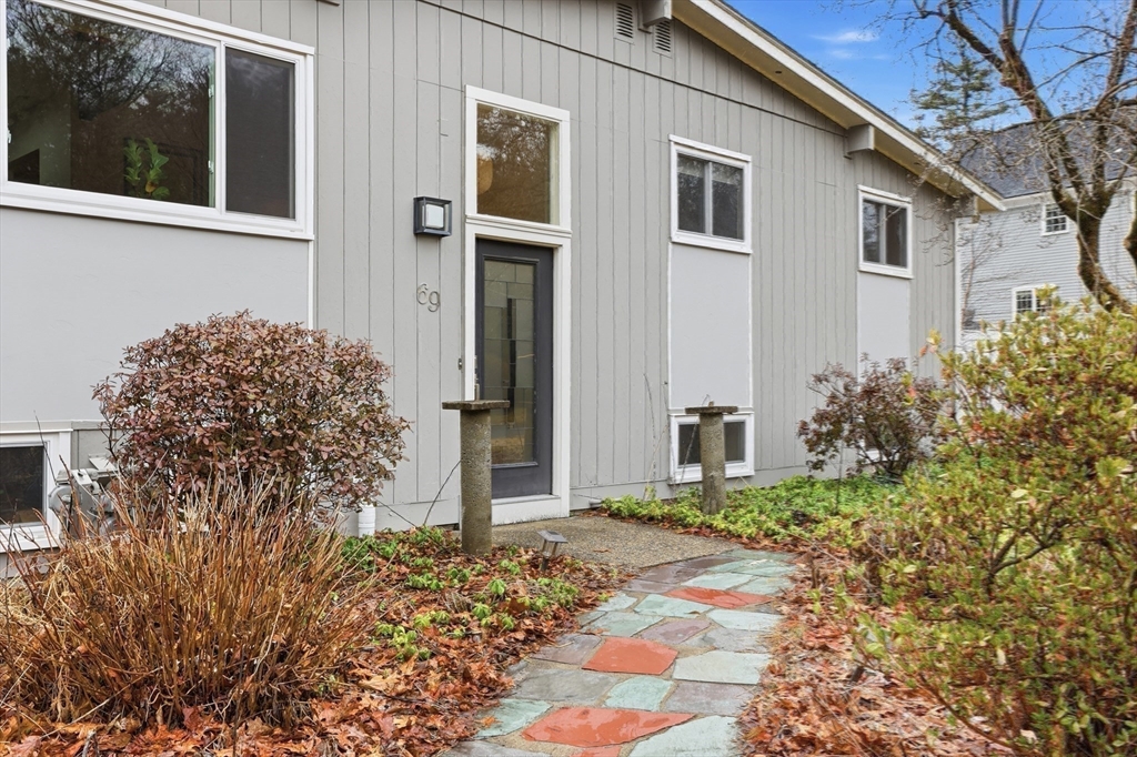 69 Robbins Road Sudbury, MA 01776 - Photo 33 of 35 a front view of a house with garden