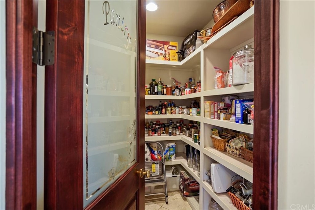 39150 Vía De Oro Temecula, CA 92592 - Photo 12 of 60 a view of a hallway with shelves