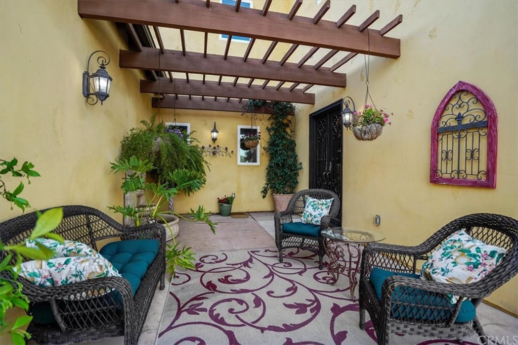 39150 Vía De Oro Temecula, CA 92592 - Photo 20 of 60 a view of a dining room with furniture and a chandelier
