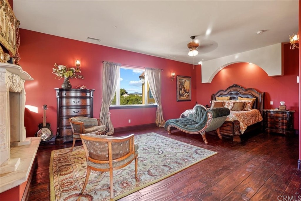39150 Vía De Oro Temecula, CA 92592 - Photo 33 of 60 a bedroom with furniture and a chandelier