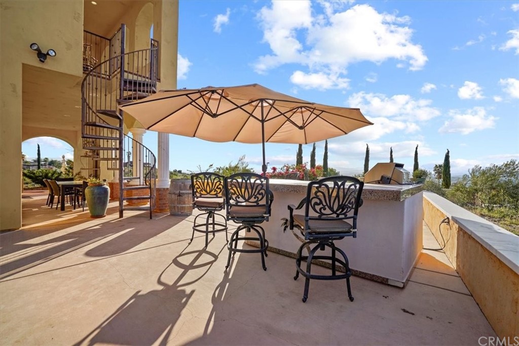 39150 Vía De Oro Temecula, CA 92592 - Photo 42 of 60 a view of a terrace with sitting area