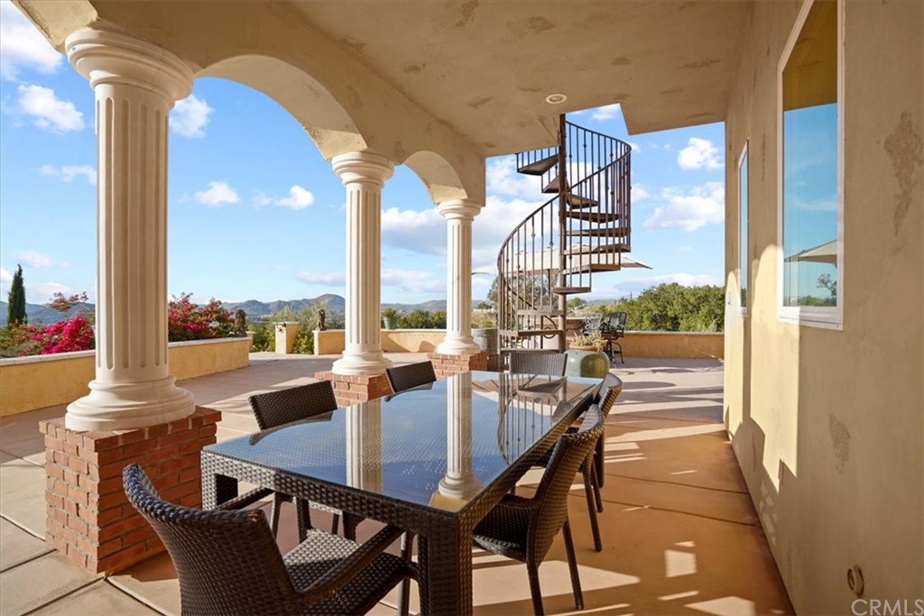 39150 Vía De Oro Temecula, CA 92592 - Photo 43 of 60 a view of a dining room with furniture window and outside view