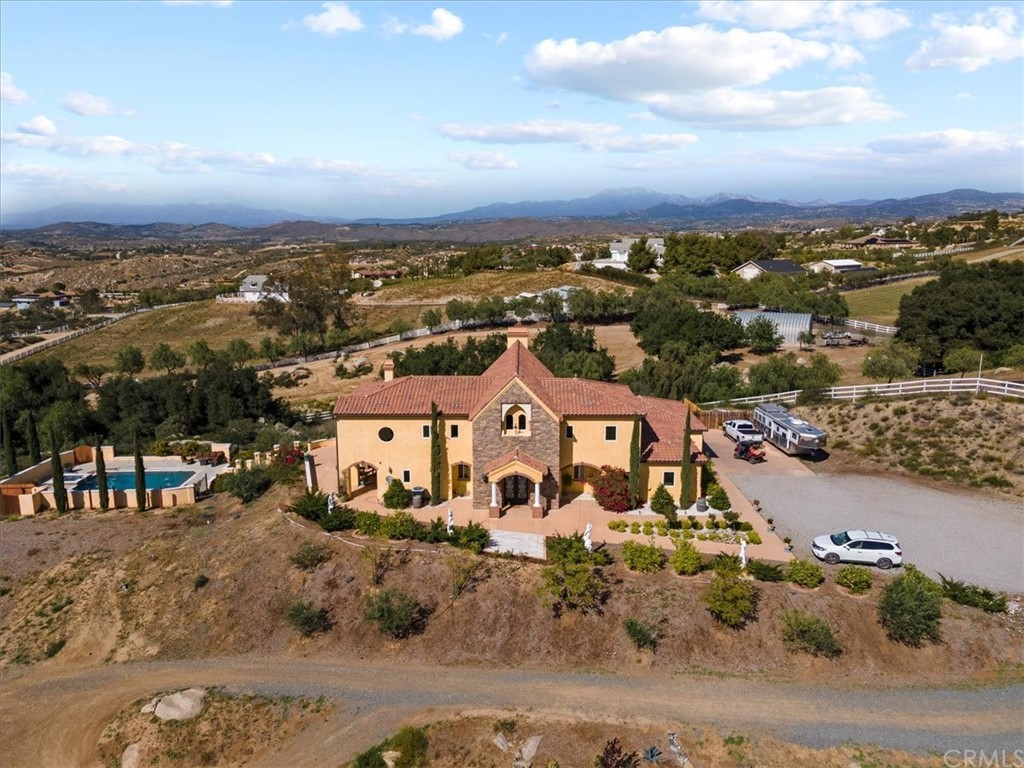 39150 Vía De Oro Temecula, CA 92592 - Photo 51 of 60 an aerial view of a house with a ocean view