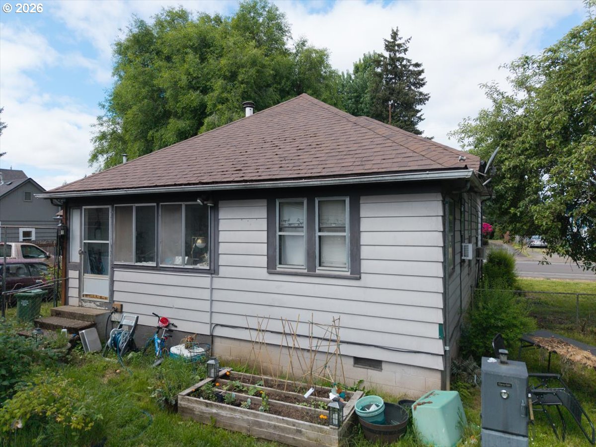 740 South 6th Street Cottage Grove, OR 97424 - Photo 21 of 21 a view of a house with a yard and sitting area