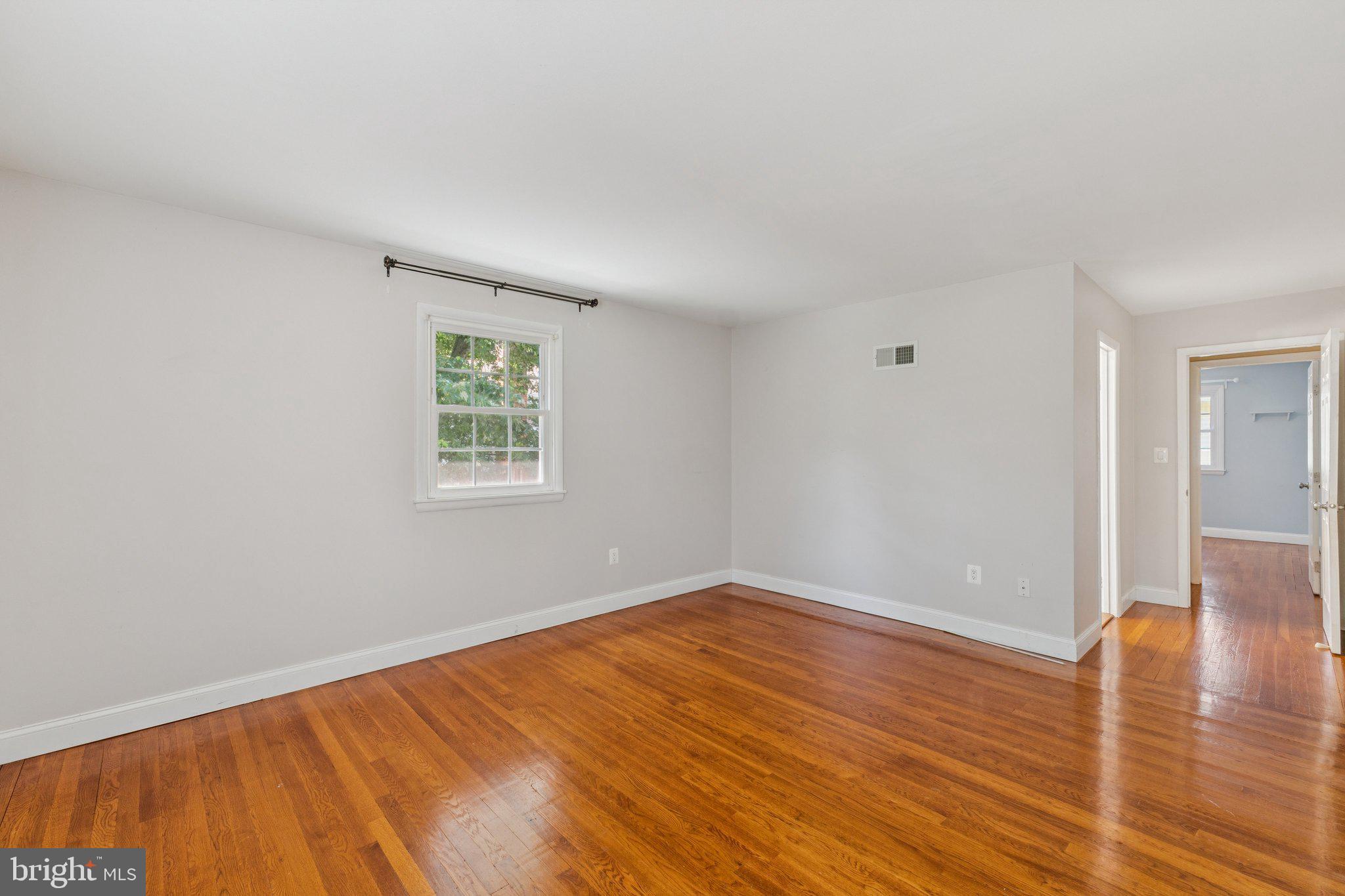 1900 Briggs Road Silver Spring, MD 20906 - Photo 21 of 44 a view of empty room with wooden floor