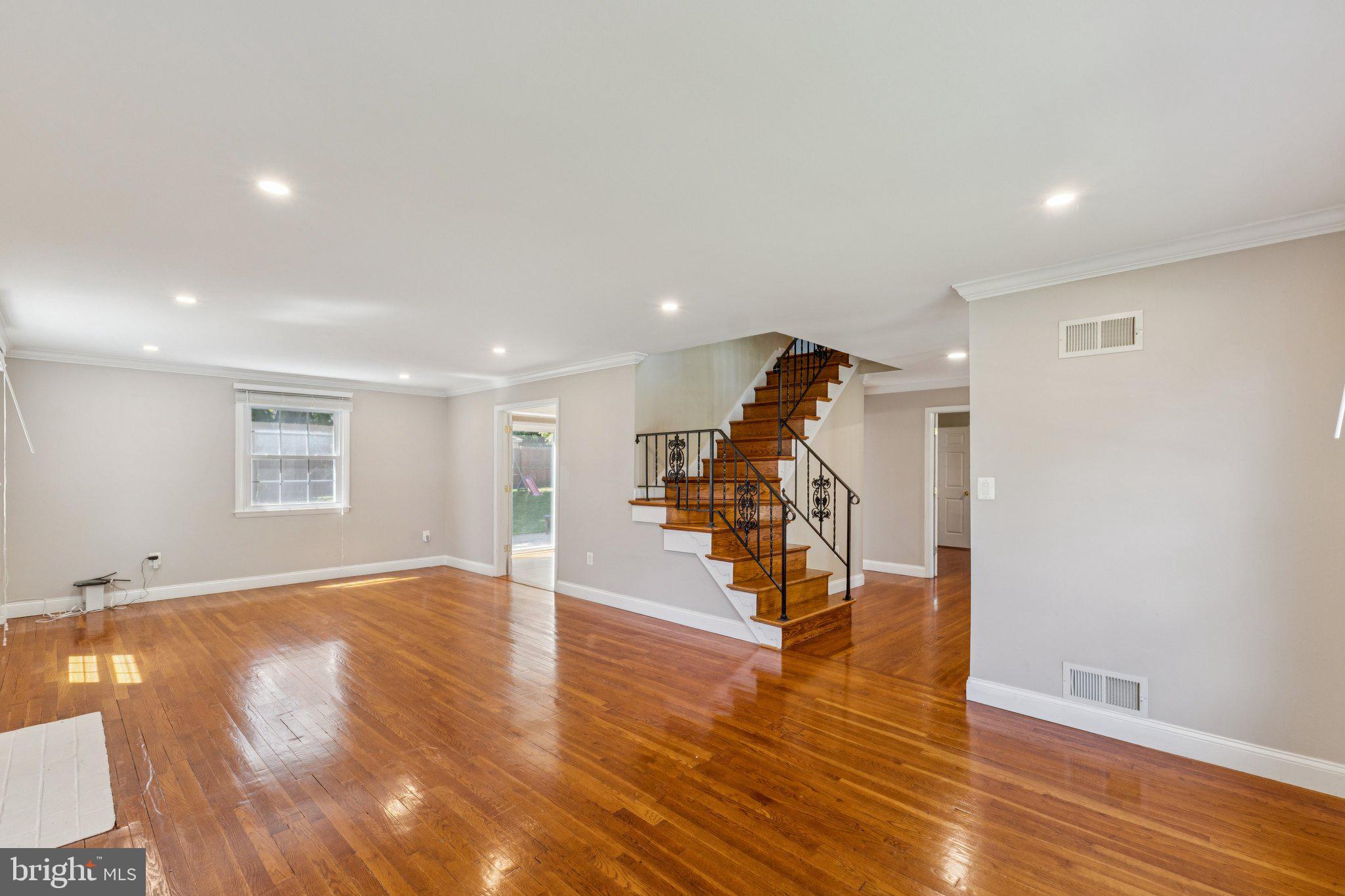 1900 Briggs Road Silver Spring, MD 20906 - Photo 5 of 44 a view of a livingroom with wooden floor