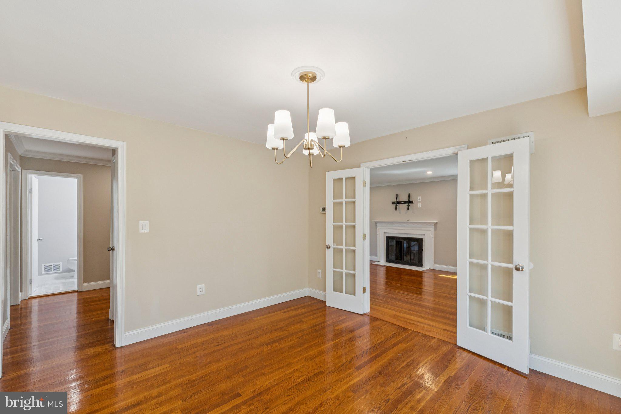 1900 Briggs Road Silver Spring, MD 20906 - Photo 10 of 44 a view of a livingroom with wooden floor