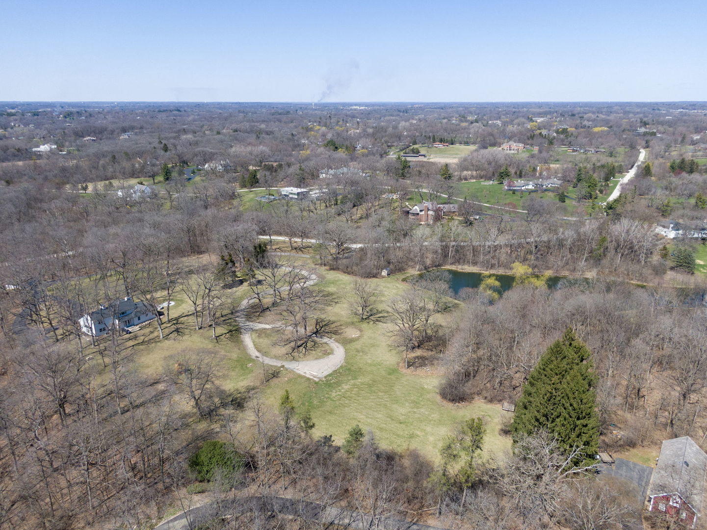77 Brinker Road Barrington Hills, IL 60010 - Photo 5 of 13 an aerial view of house with yard and mountain in the back