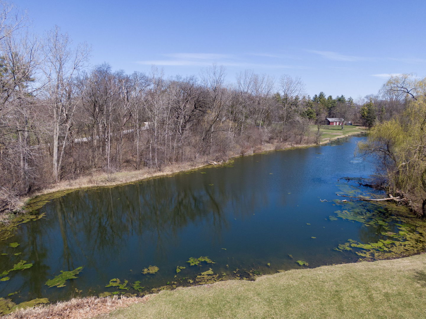 77 Brinker Road Barrington Hills, IL 60010 - Photo 10 of 13 a view of a yard with a tree