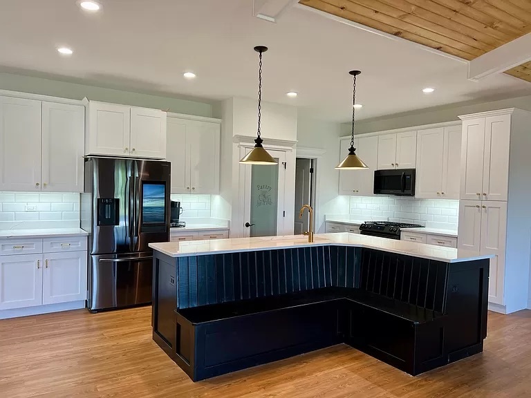 26501 Stephanie Drive Channahon, IL 60410 - Photo 12 of 14 a kitchen with stainless steel appliances granite countertop a sink and a refrigerator
