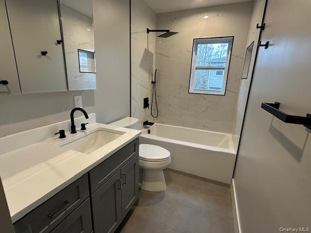 5 Linwood Road North, Unit 2 Port Washington, NY 11050 - Photo 10 of 12 Bathroom featuring vanity and shower / bath combination