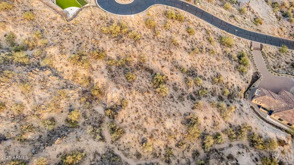 a view of a house with a mountain in the background