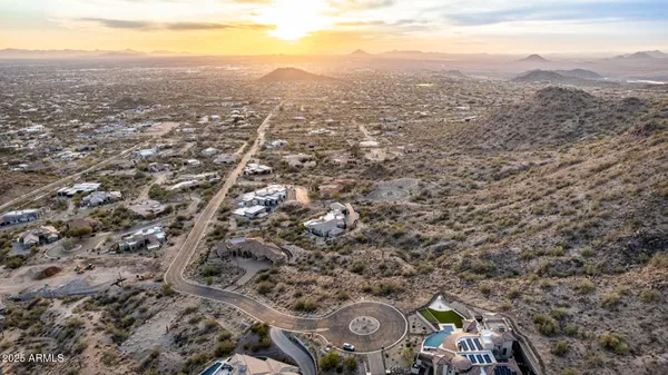 an aerial view of residential house with parking space