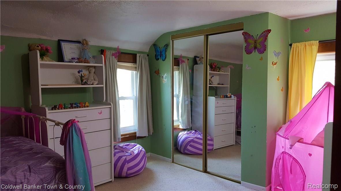 8462 McClements Road Brighton, MI 48114 - Photo 29 of 42 Bedroom4.jpg