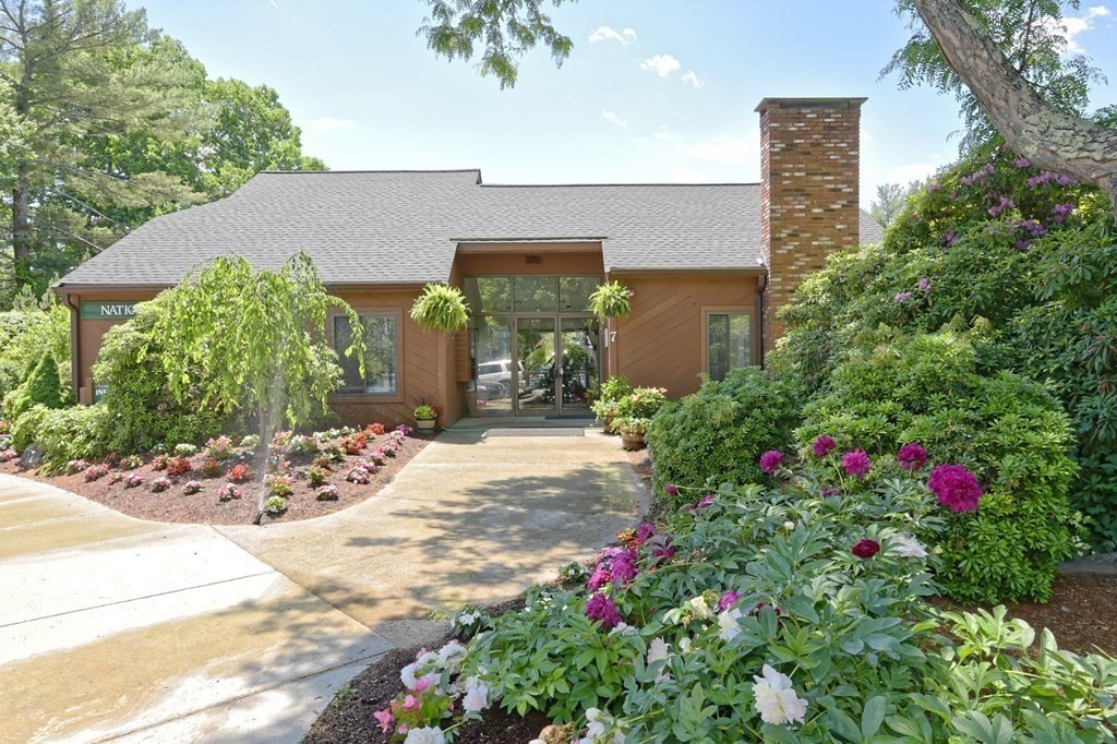 32 Silver Hill Lane, Unit 1 Natick, MA 01760 - Photo 27 of 36 a view of a house with potted plants