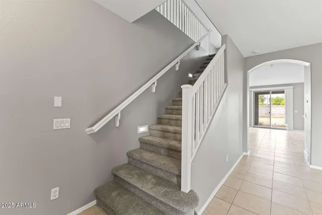 a front view of a house with parking