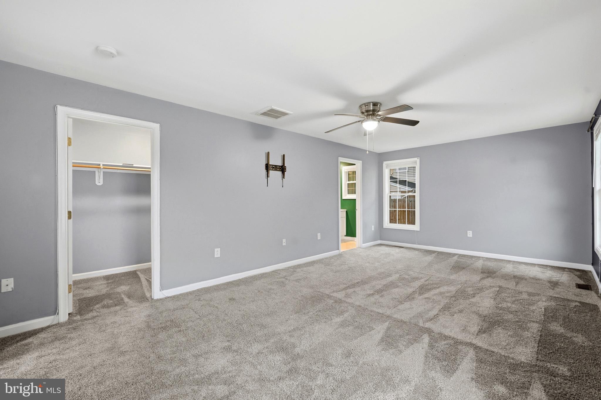 6743 Amherst Road Bryans Road, MD 20616 - Photo 21 of 45 Primary bedroom with ceiling fan
