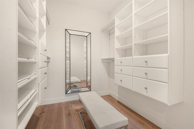 a view of an empty walk in closet