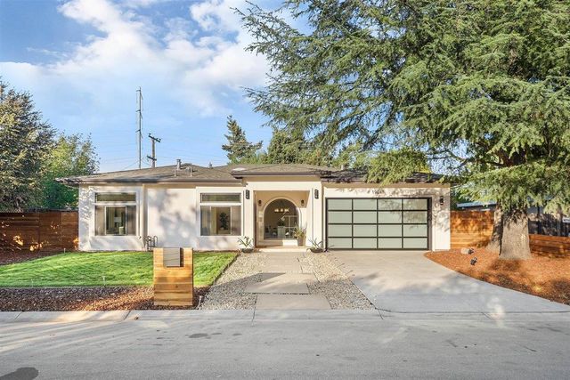 front view of a house with a patio