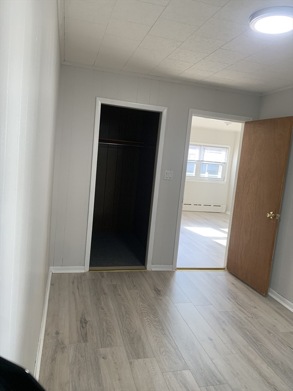 86 Hunter Street, Unit 1N Fall River, MA 02721 - Photo 2 of 4 wooden floor in an empty room