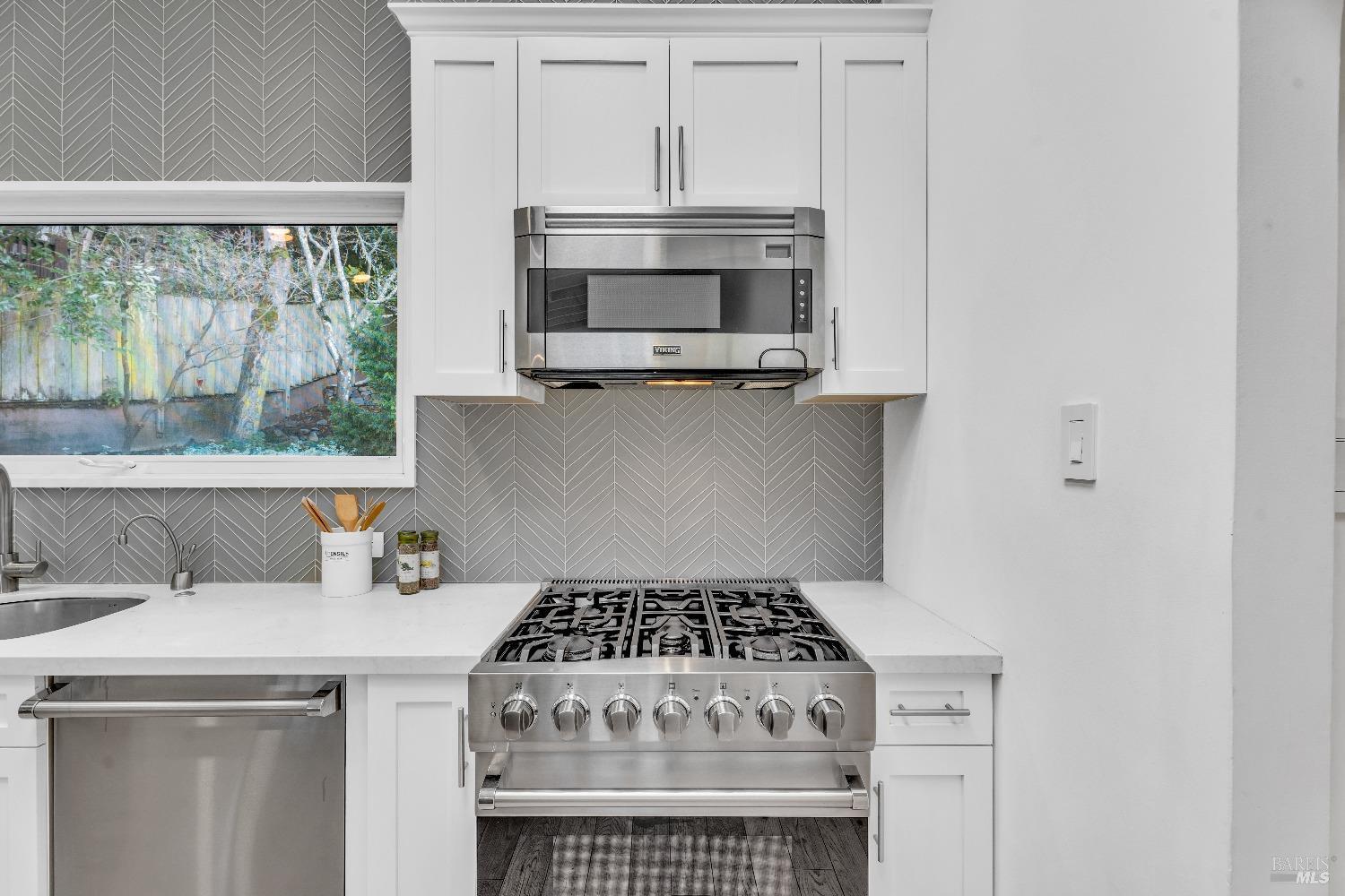 30 Bella Vista Avenue Belvedere, CA 94920 - Photo 17 of 89 a kitchen with a stove and a microwave
