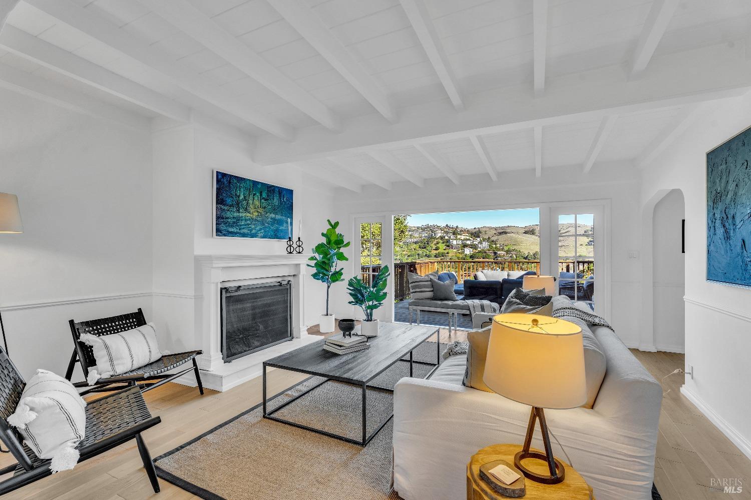 30 Bella Vista Avenue Belvedere, CA 94920 - Photo 2 of 89 a living room with furniture and a fireplace