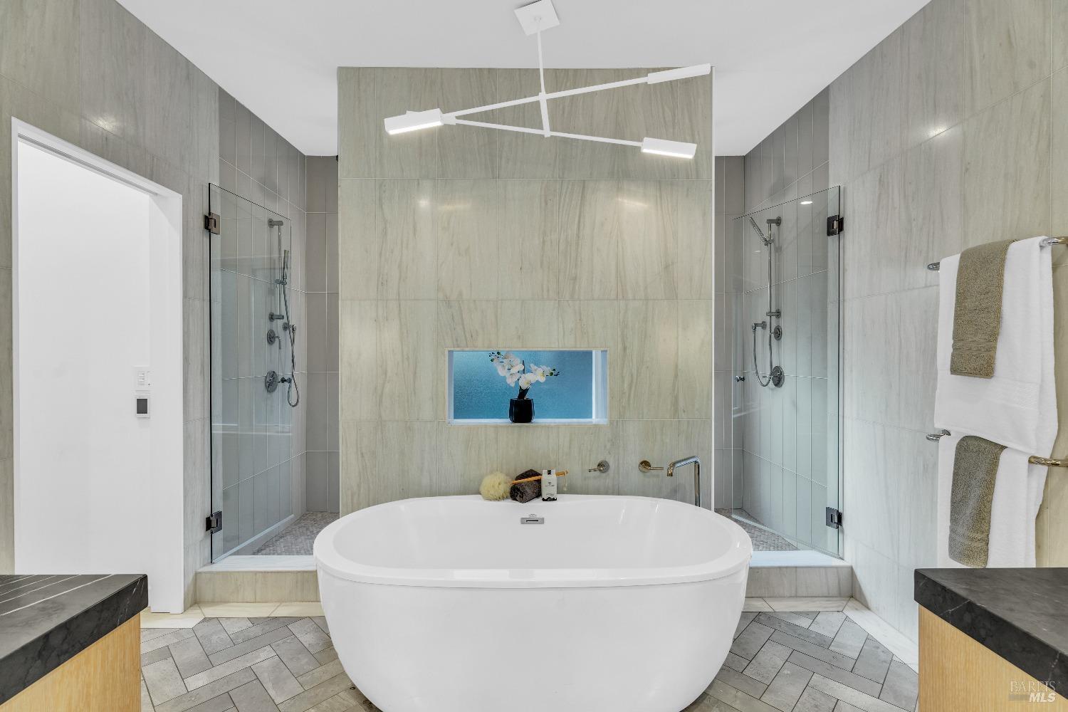 30 Bella Vista Avenue Belvedere, CA 94920 - Photo 28 of 89 a white bath tub sitting in a bathroom and shower