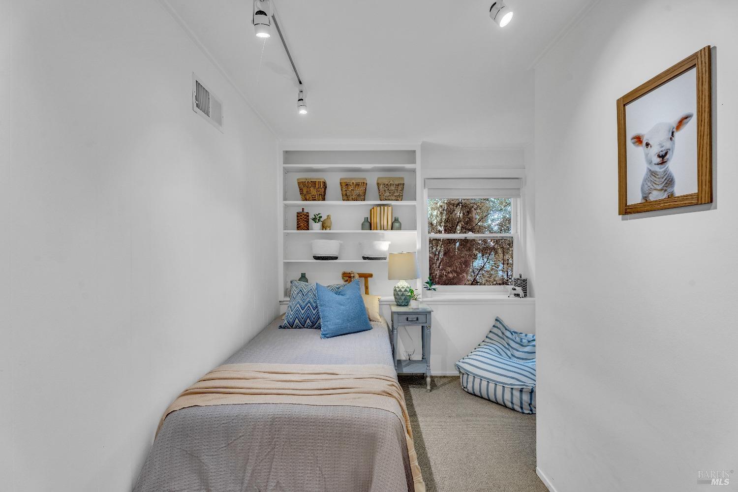 30 Bella Vista Avenue Belvedere, CA 94920 - Photo 48 of 89 a living room with furniture and a window