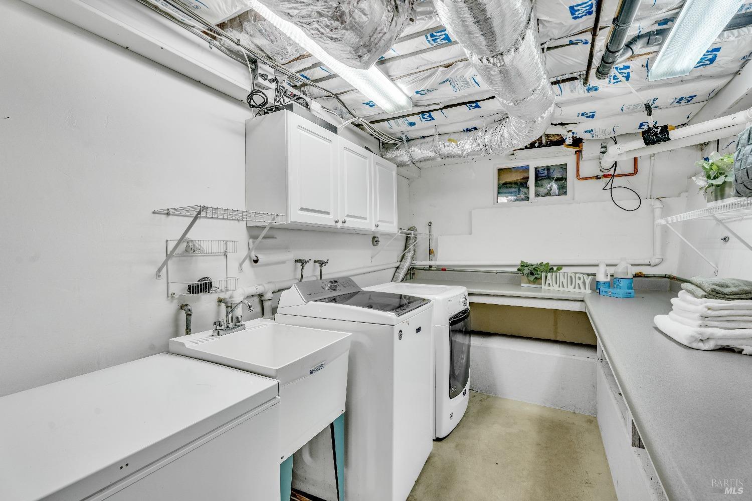 30 Bella Vista Avenue Belvedere, CA 94920 - Photo 77 of 89 a kitchen with a sink a stove and cabinets