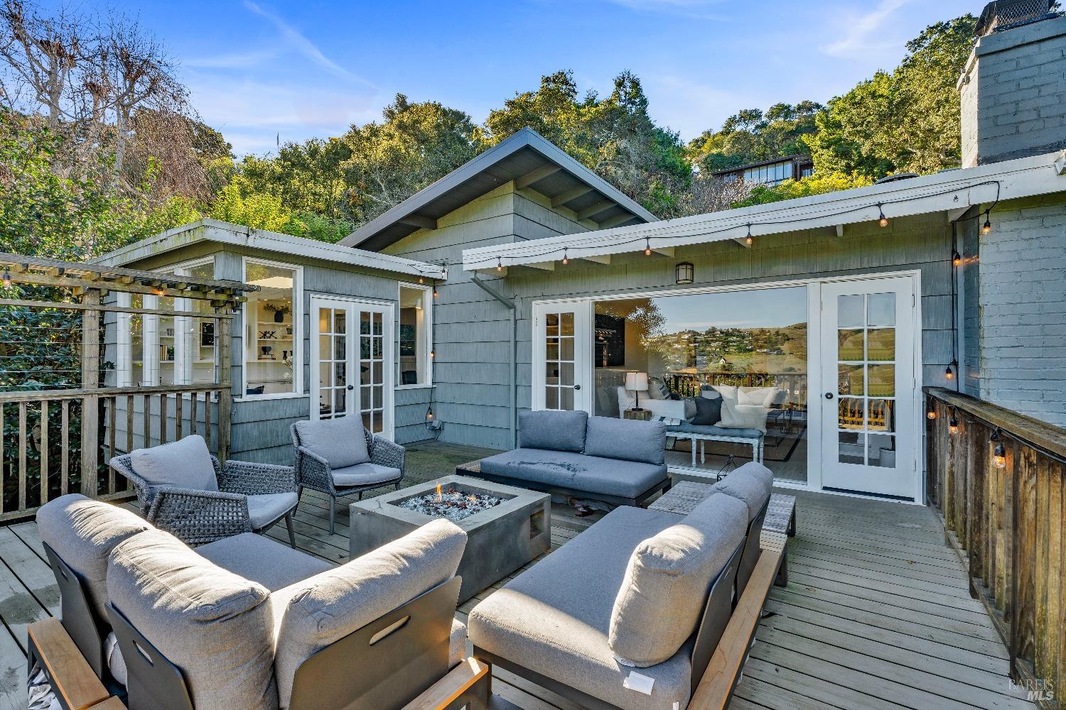 30 Bella Vista Avenue Belvedere, CA 94920 - Photo 10 of 89 a view of a patio with couches chairs and wooden floor