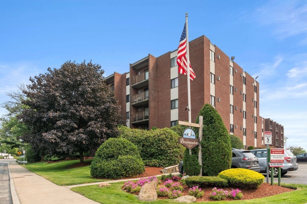 135 Franklin Street, Unit 101 Stoneham, MA 02180 - Photo 22 of 24 a view of a blue and white house