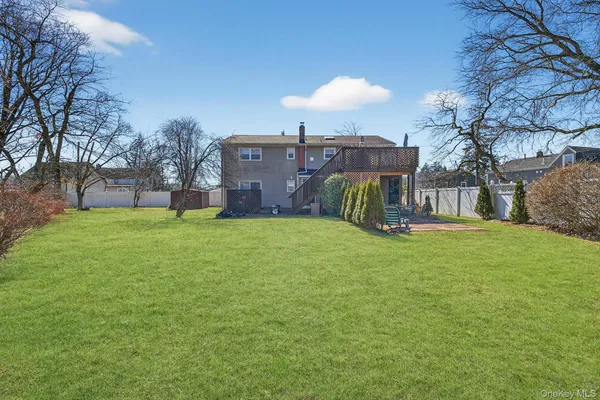 a view of a house with a back yard