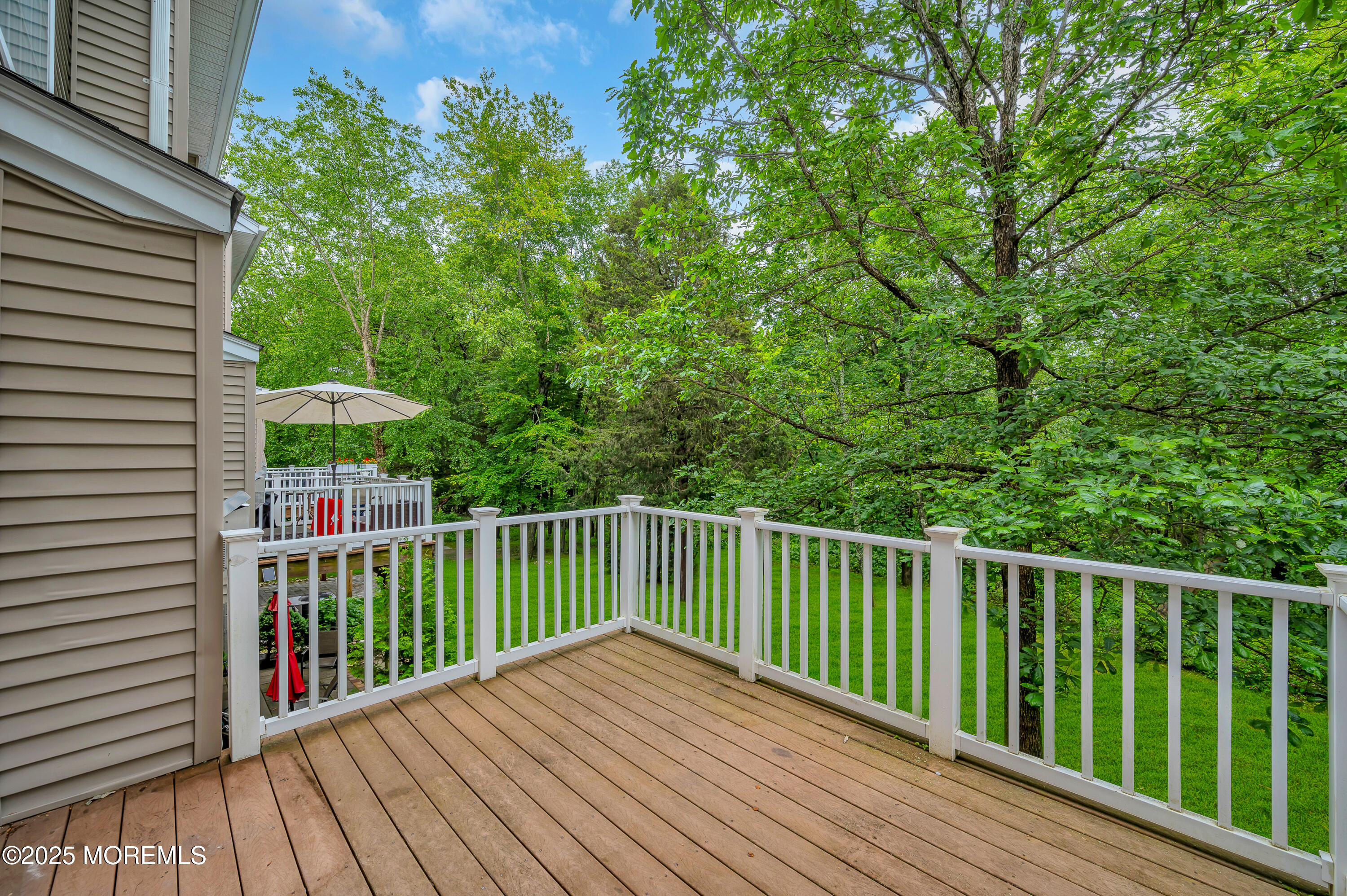 59 Brookfield Drive Jackson, NJ 08527 - Photo 16 of 42 a view of balcony with wooden floor