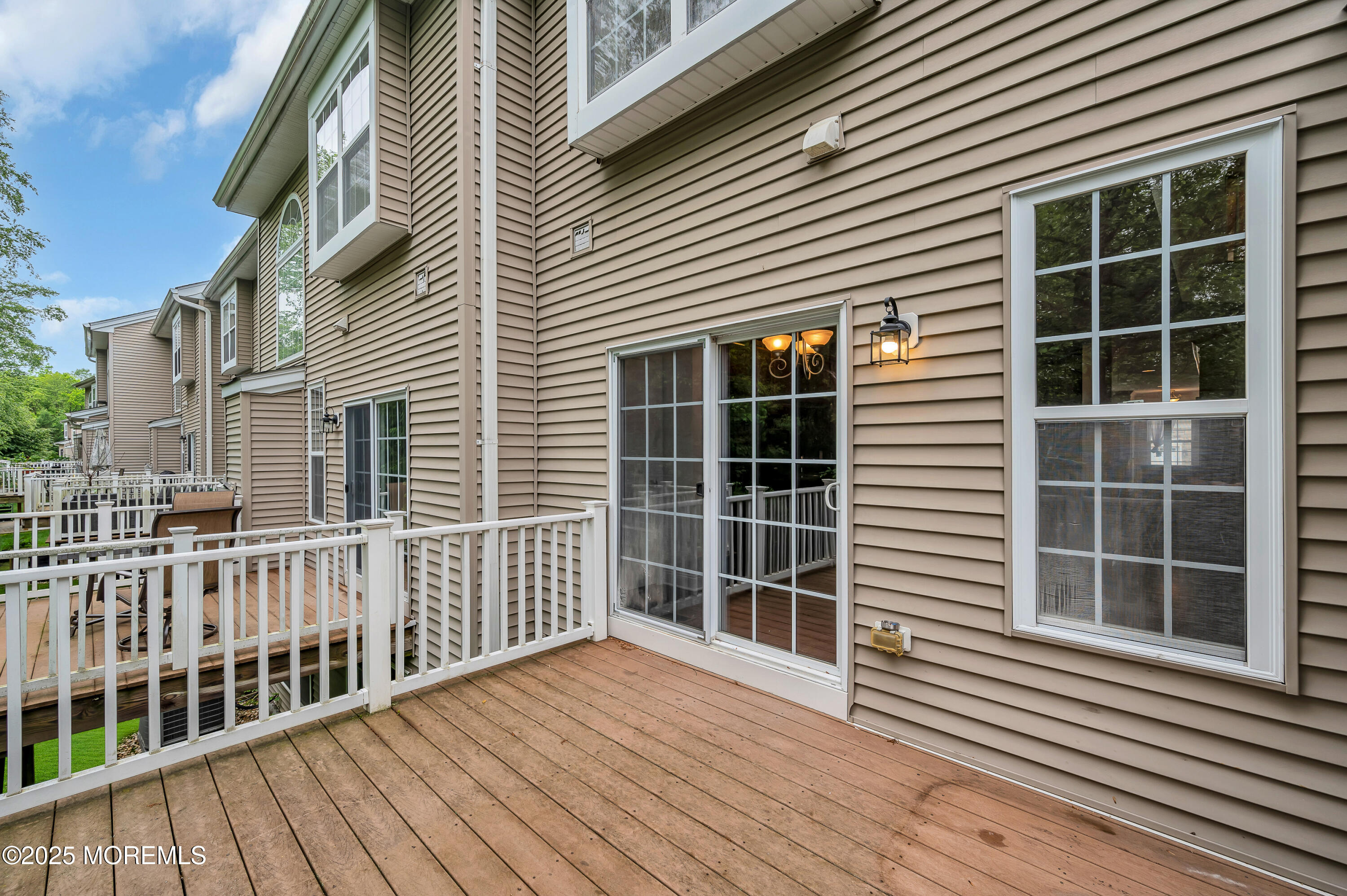 59 Brookfield Drive Jackson, NJ 08527 - Photo 17 of 42 a view of a house with a large window